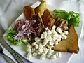 Chicharrón, Spanish fried pork rinds, widely distributed throughout Hispanic world.