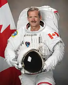 Canadian Space Agency astronaut Chris Hadfield, attired in a training version of his Extravehicular Mobility Unit (EMU) spacesuit.