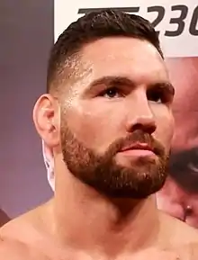 Chris Weidman, American professional mixed martial artist (BA '07)