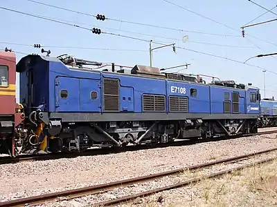 No. E7108 in Spoornet blue livery with solid numbers, Pyramid South, Gauteng, 22 September 2015