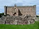 The parish church built using stones from the priory