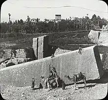 The "Stone of the Pregnant Woman" in the early 20th century, the Temple of Jupiter in the background