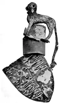 Shield, helmet and crest of Edward, the Black Prince, suspended over his tomb in Canterbury Cathedral