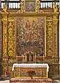 Altar in Iglesia de la Concepción, Santa Cruz de Tenerife. Top: Trinity; Mid-top: Mary, John the Baptist, Holy family; Mid: archangel Michael;  Lower: Saints interceding; Bottom: souls undergoing fiery purgation, still with worldly attachments (shackles) and venial sins (snakes).