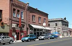 Photo of three historic commercial buildings.