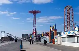 View looking west from Riegelmann Boardwalk; the B&B Carousell is the structure with the multicolored sign at bottom center, just behind the "Thunderbolt" sign