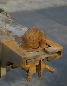 Rusty twistlock on a semi-trailer