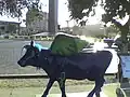 View of Sueñame cow, in front of the Monumento a la Raza