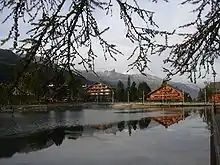 Photo of Swiss chalets on a mountain lakeshore