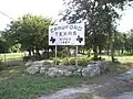 Welcome sign into Crawford on FM 185.