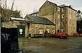 The usable mill building undergoing work to replace many stone lintels and reinstate the original Georgian windows