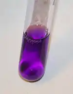 Purple liquid in a test tube