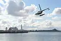 Helicopter taking off in front of Cunningham Pier