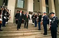 Secretary of Defense Donald Rumsfeld with President George W. Bush, following President Bush's visit to The Pentagon to address military and Department of Defense personnel and sign the Defense Appropriations Bill, January 10, 2002