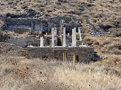 Two stories of Corinthian atria/peristyles. House of the Hermes, Roman-era Delos.