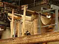 Punched cards in use in a Jacquard loom.