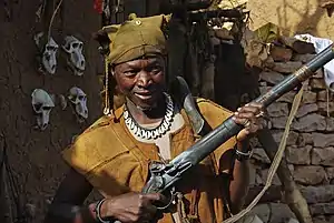 Image 27A Dogon hunter with an old flintlock rifle still in use. (from Culture of Mali)