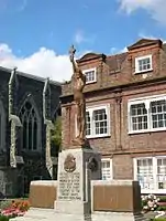 Dover War Memorial (1924) in public square in front of Dover Town Council building