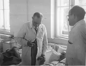 Kenessey (left) at work in the hospital in Balassagyarmat