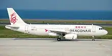 An Airbus A320-200 painted in Dragonair's livery taxiing on the taxiway