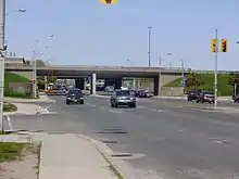 Cars on a wide roadway