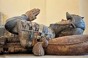 The Tomb of Philippe Pot (d. 1493) with amour and a heraldry shield.