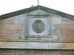 The Montgomerie family crest on the Stables/offices/coach house