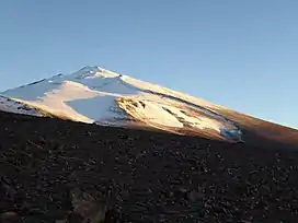 El Ermitaño as seen at sunrise from a camp above Laguna Verde