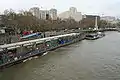 A Bateaux London restaurant boat at the pier