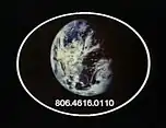 A screen with an image of the Earth. It is labeled with an identifier: 806.4616.0110