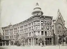 A black-and-white picture of a large builing