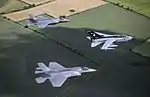 A pair of F-35B Lightnings operating alongside a Tornado GR4