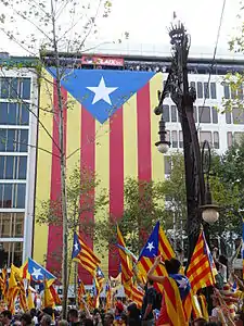 The Demonstration "Catalunya, nou estat d'Europa" of 11 September 2012. Estelada hanging between Carrer de Mallorca and Carrer de València, along Passeig de Gracia.