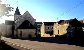 The church and surroundings in Faverolles-lès-Lucey