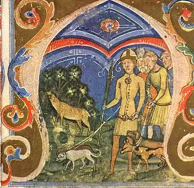 Four men, one of the leading three dogs, in pursuit of a deer