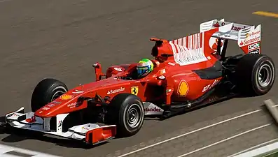 Ferrari F10 with vertical fin between air inlet and wing