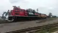 Ferrosur EMD SD70ACe locomotive 4124, equipped with experimental sheet-metal awnings over the radiator air intakes