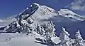 Northwest aspect of Fissile Peak and Whirlwind Peak (behind, right) in winter.