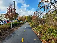 A rail trail in a suburban area