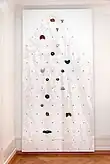 A DIY climbing wall with a hole pattern that replicates Fitz Roy's famous peak