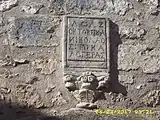 plaque of Nikolaos Kalogeras on the Five-Terraced House of Monemvasia, Greece