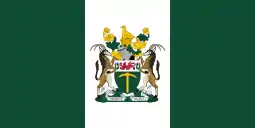 A flag with vertical green, white and green stripes, with a coat of arms on the central white stripe.