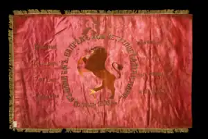 Flag of the Ohrid insurgents used during the Ilinden uprising, 1903. The lion is depicted dismembering the Islamic star and crescent. On the flag is written part of the Hristo Botev's 1873 poem dedicated to Hadzhi Dimitar.