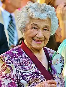 Filipina American woman with gray hair