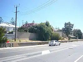 The old Grange station remnants in 2008. A fence has since been installed on the platform.