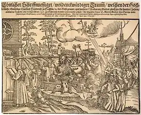 Print showing Luther inscribing a church door with a giant quill. The opposite end of the quill pierces a lion's head. There are many other symbolic and historical figures.