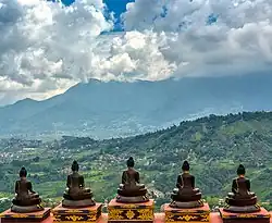 Statues of five meditating Buddha at Amitabha Monastery