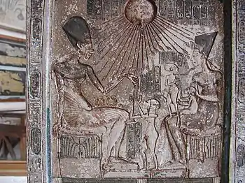 Akhenaten, Nefertiti and their daughters before the Aten. Stela of Akhenaten and his family, Egyptian Museum, Cairo.