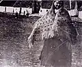 Woman wearing a Galway shawl in Galway, Ireland.