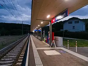 Canopy-covered platform next to railway track